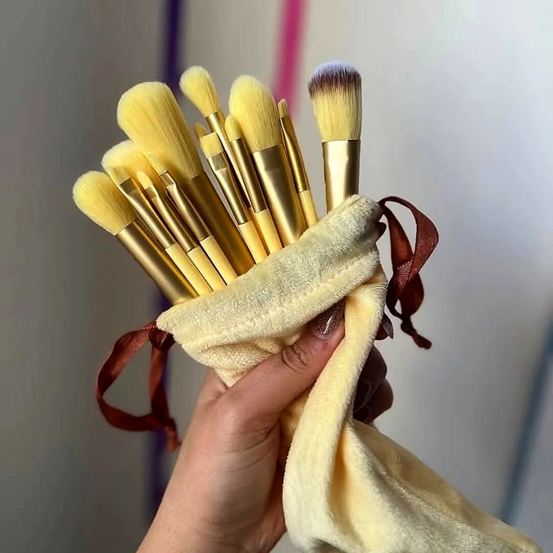 MK Signature Ivory Edit 13-piece makeup brush set with gold handles