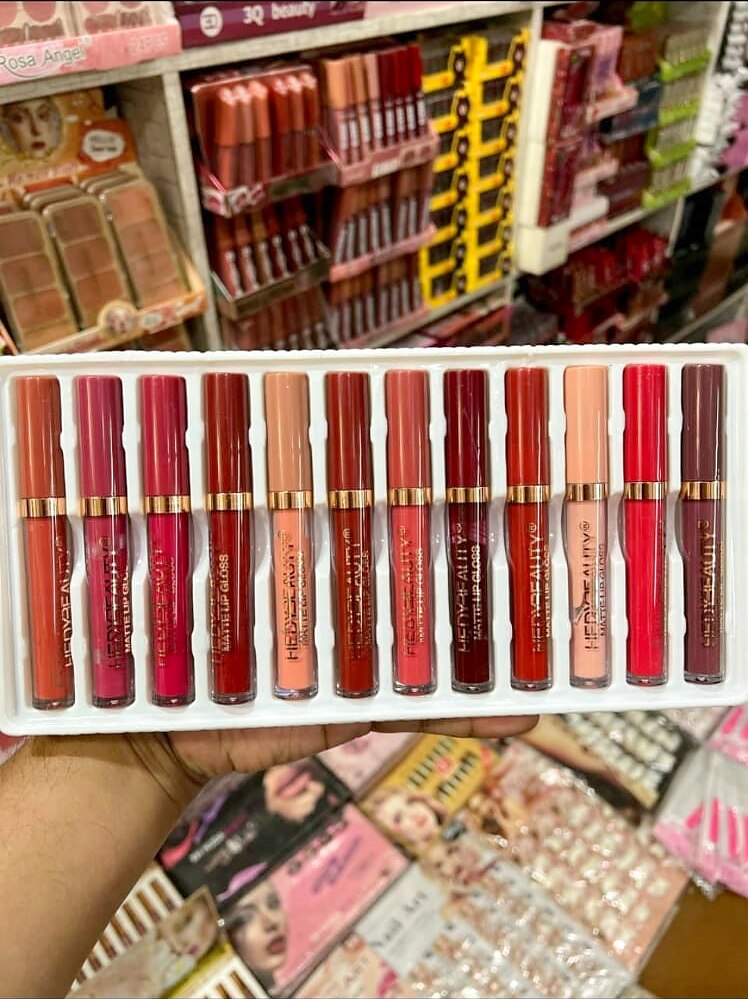 MK Signature Matte Lip Vault, a set of 12 matte lip gloss shades in a tray
